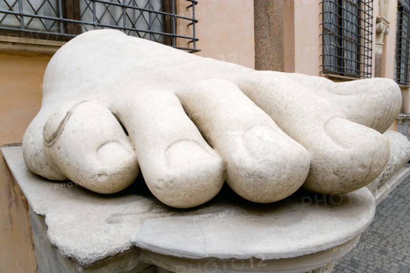 ITALY, Lazio, Rome, Palazzo Dei Conservatore courtyard part of the Capitoline Museums with giant marble feet from various ancient colossus statues