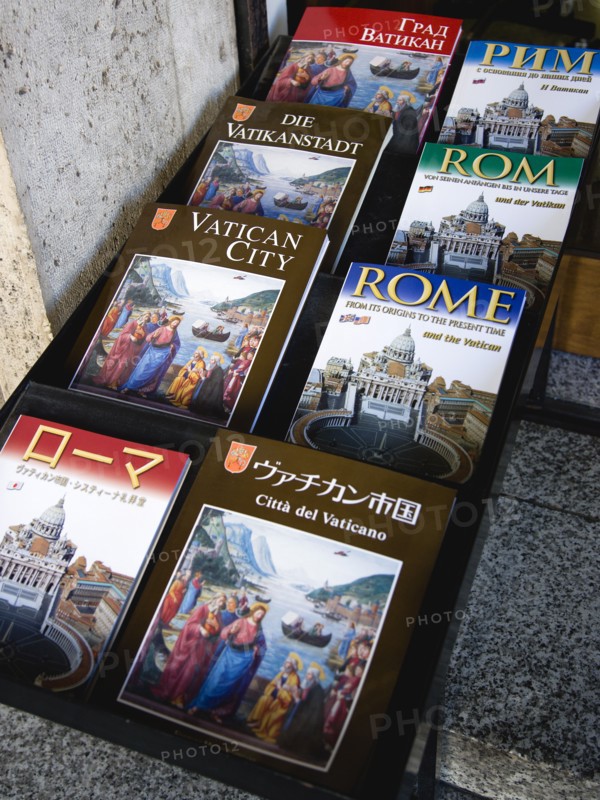 ITALY, Lazio, Rome, Display of guide books to the city and the Vatican in different languages
