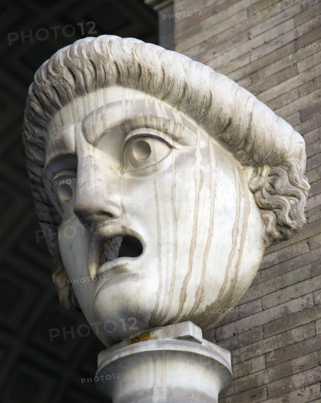 ITALY, Lazio, Rome, Vatican City Museums A carved face with gaping open mouth in the Octagonal Courtyard of the Belvedere Palace