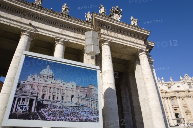 ITALY, Lazio, Rome, Vatican City A giant  video television screen in Piazza San Pietro in front of the basilica of Saint Peter showing the whole square during an audience by Pope Benedict XVI