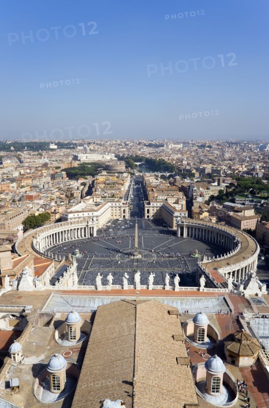ITALY, Lazio, Rome, Vatican City View from the Dome of the Basilica of St peter across the Piazza San Pietro circled by Bernini colonnade towards Castel Sant Angelo and the River Tiber