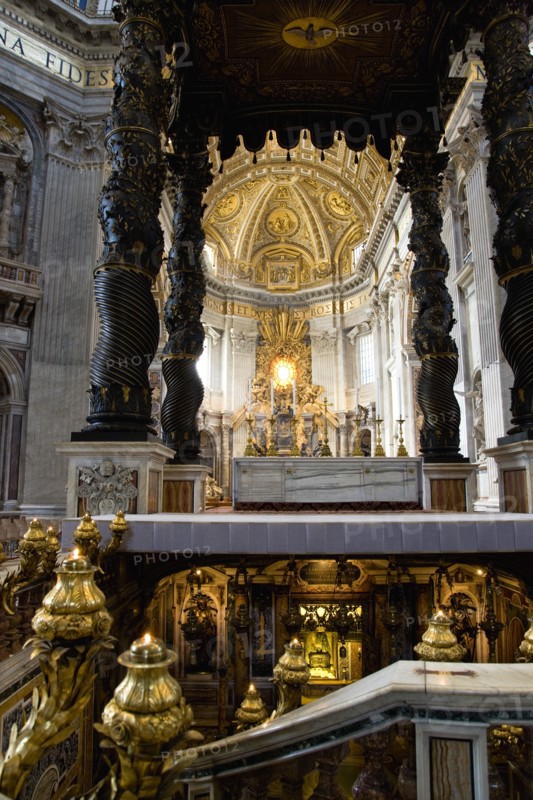 ITALY, Lazio, Rome, Vatican City The Basilica of St Peter The canopied Baldacchino by Bernini with his Throne of Saint Peter in Glory beyond