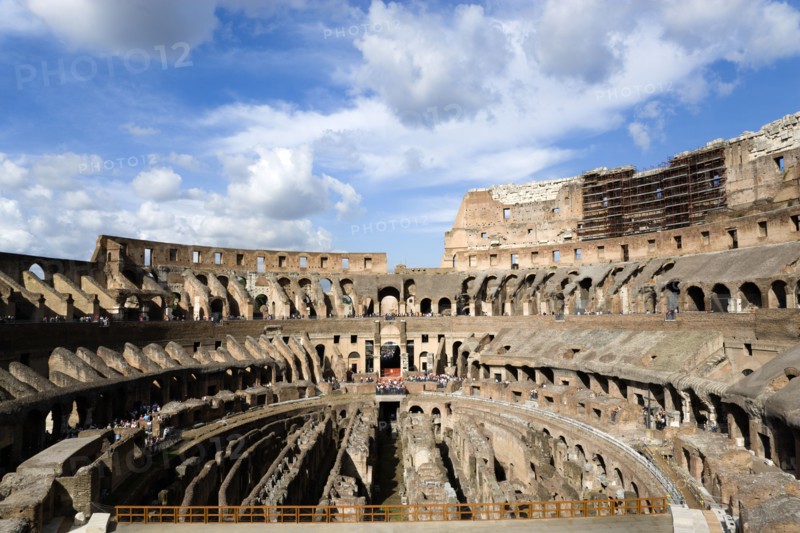 ITALY, Lazio, Rome, The interior of the Colosseum with viewing tourists