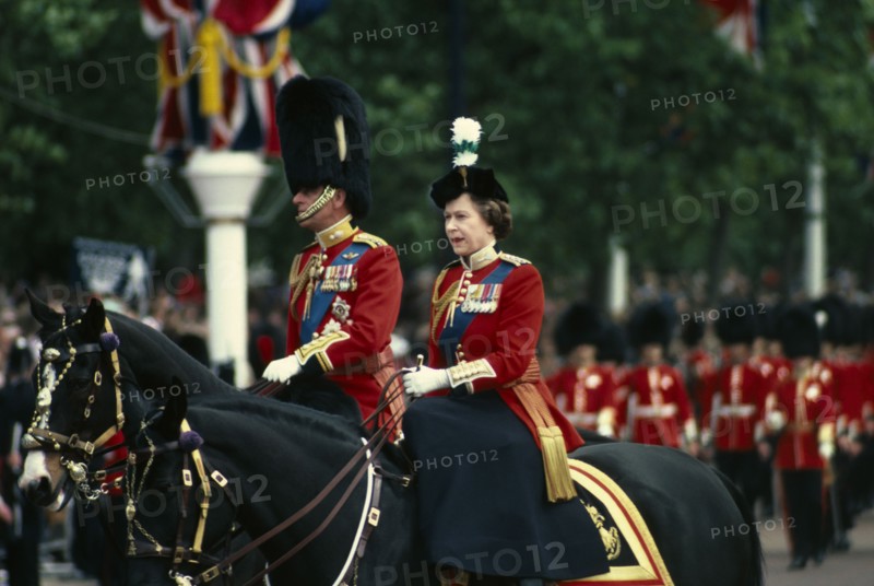 ENGLAND, London, The Queen and The Duke of Edinburgh on horseback returning from Trooping the Colour