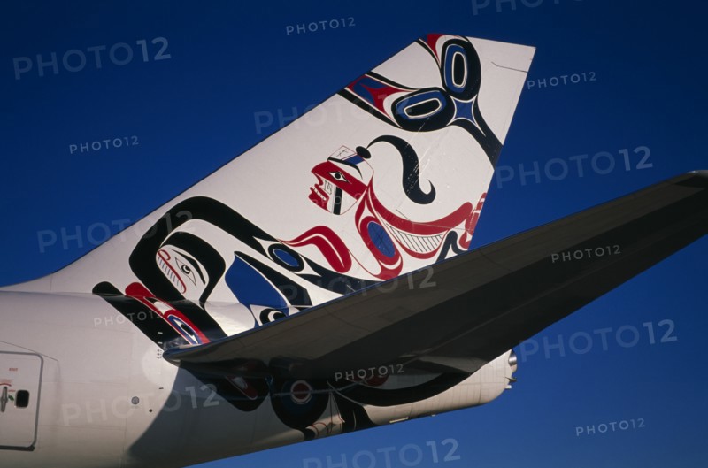 TRANSPORT, Air, Plane Detail, Boeing 747-400 at Gatwick Airport operated by British Airways. Detail of tail design by artist Joe David from Canada entitled Whale Rider