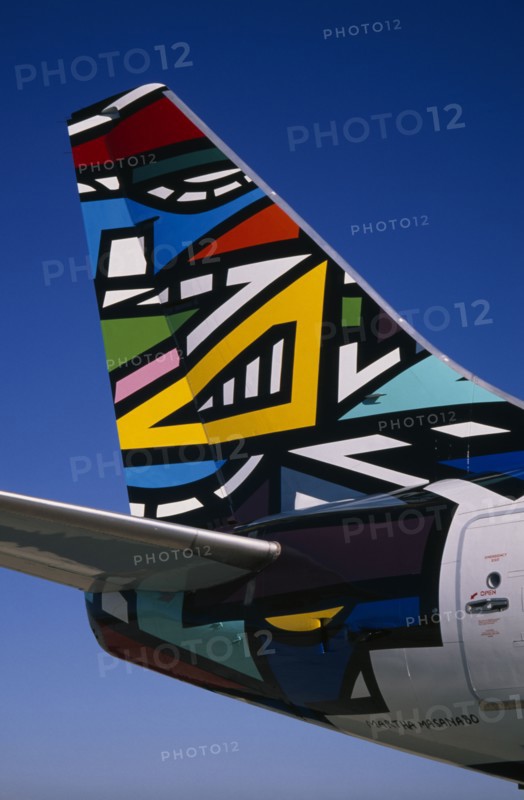 TRANSPORT, Air, Plane Detail, Boeing 737 at Gatwick Airport operated by British Airways. Detail of tail design by artists Emmly and Martha Masanabo from South Africa entitled Ndebele