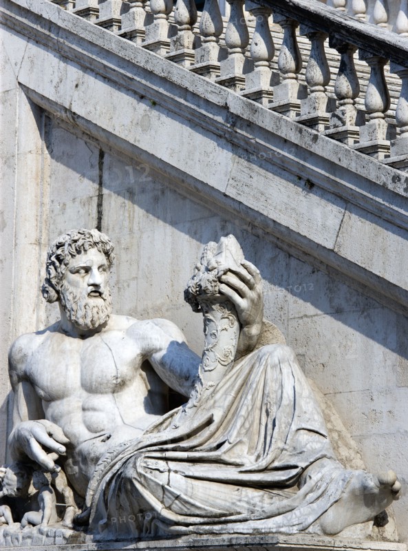 ITALY, Lazio, Rome, Palazzo Senatorio on the Capitol with a staircase by Michelangelo and a statue representing the River Tiber from Hadrian's baths on the Quirinal