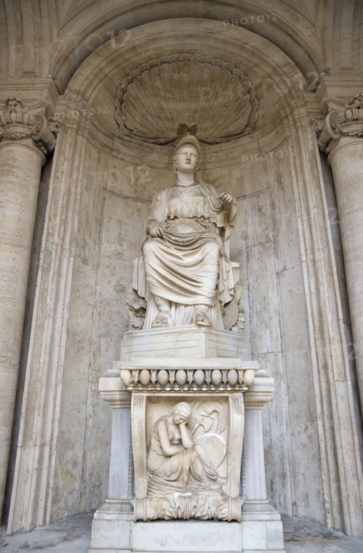 ITALY, Lazio, Rome, Colossal Statue of Sitting Rome Cesi Roma in a niche within the courtyard of the Palazzo dei Conservatori on the Capitol. The marble statue of a seated woman dates from the Hadrian period of 117-138 BC