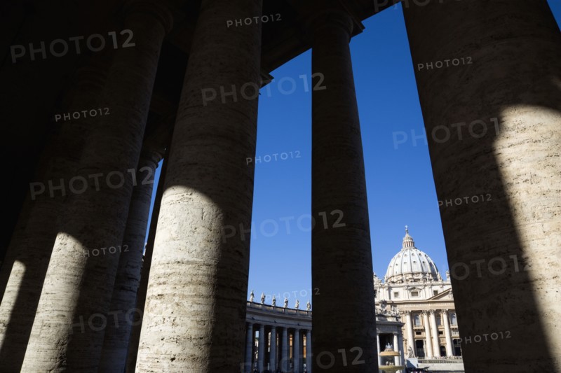 ITALY, Lazio, Rome, Vatican City The facade of the Basilica of St Peter seen through the colonnade by Bernini
