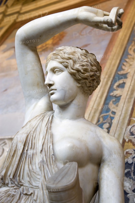 ITALY, Lazio, Rome, Vatican City Museum Marble statue of a semi naked woman with one arm raised in the Room of The Busts of the Belvedere Palace