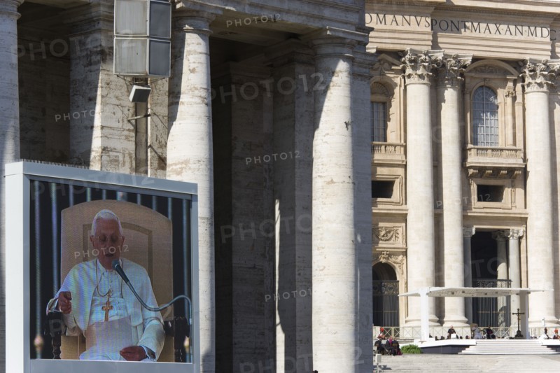 ITALY, Lazio, Rome,  Vatican City Pope Benedict XVI Joseph Alois Radzinger seen on a large video TV monitor display and seated under a canopy in St Peter's Square for the wednesday Papal Audience in front of the Basilica