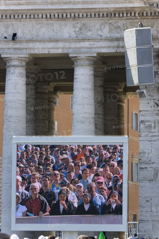 ITALY, Lazio, Rome, Vatican City Pilgrims seen on a large video TV monitor display in St Peter's Square for the wednesday Papal Audience in front of the Basilica given by Pope Benedict XVI Joseph Alois Radzinger