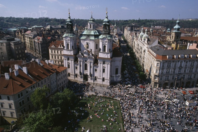 CZECH REPUBLIC, Prague, Elevated view over Old Town Square crowds and surrounding architecture.