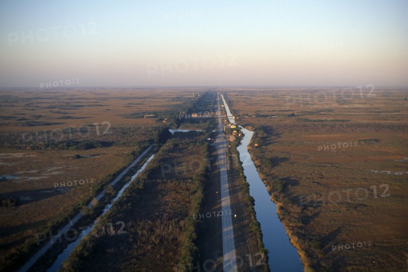 USA, Florida, Everglades, Aerial view over drainage canal and highway
