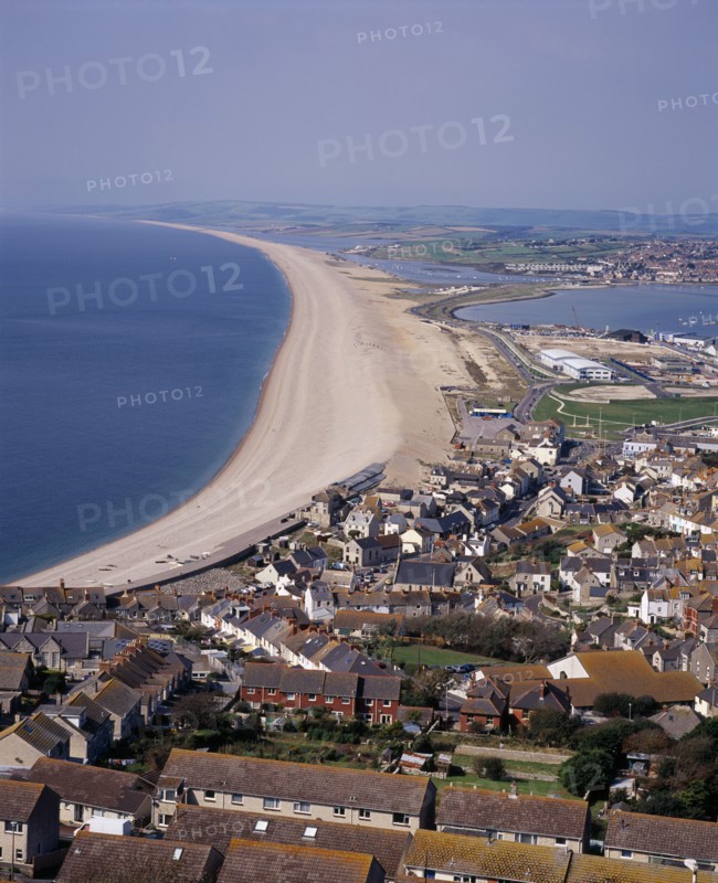 ENGLAND, Dorset, Portland, Elevated view over Chesil Beach from cliff path above town of Fortuneswell on Isle of Portland