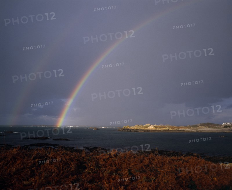 UNITED KINGDOM, Channel Islands, Guernsey, Double Rainbow over Lihou Island