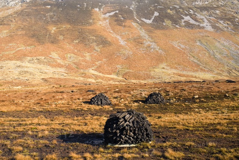 20093578 IRELAND Galway Connemara Maumturk Mountains with turf stacks