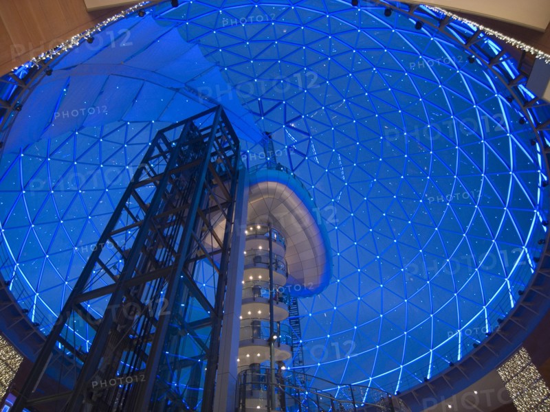 IRELAND, North, Belfast, Victoria Square shopping centre decorated for Christmas. View of the glass dome illuminated at night.