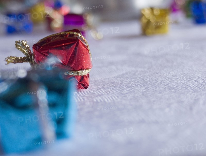 FESTIVALS, Religious, Christmas, Minature wrapped Christmas presents used as festive dinner table decorations.