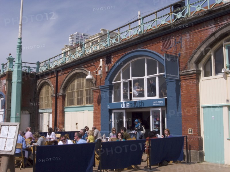 ENGLAND, East Sussex, Brighton, Due South restaurant in the arches underneath the promenade.