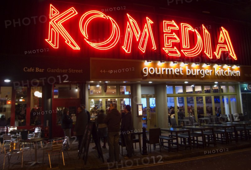 ENGLAND, East Sussex, Brighton, "Exterior of the Komedia theatre, cafe and bar in Gardner Street. Neon Sign"