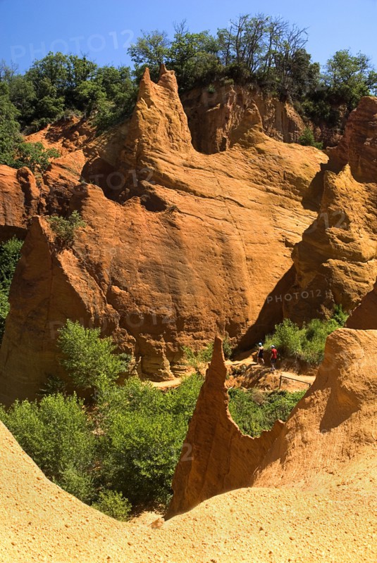 FRANCE, Provence Cote d’Azur, Vaucluse, Colorado Provencal.  Cheminee de Fee or Fairy Chimneys.  Area of eroded ochre rock cliffs and pinnacles from viewpoint
