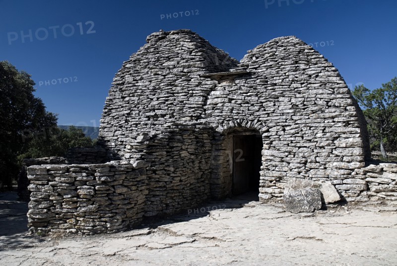 FRANCE, Provence Cote d’Azur, Vaucluse, "Le Village des Bories.  Primitive abandoned village comprising of stone Bories, also known as Gallic Huts each with a specific function, this is a dwelling house."