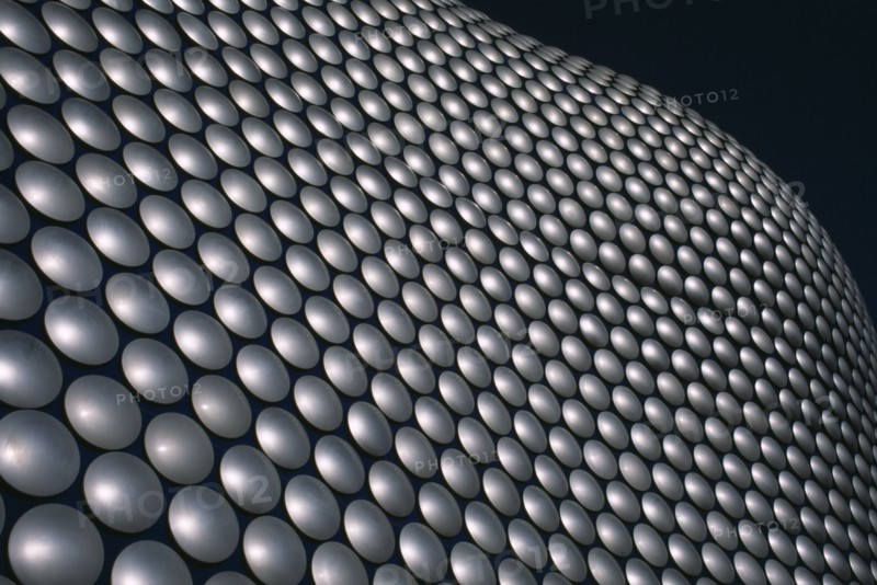 ENGLAND, West Midlands, Birmingham, Selfridges Store at The Bullring Shopping Centre. Exterior detail of the spun aluminium discs.