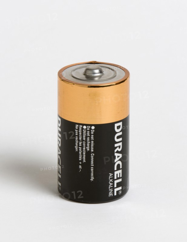 INDUSTRY, Power, Electric, An alkaline battery on a white background