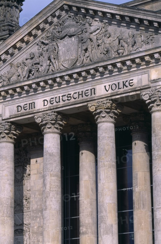 GERMANY, Berlin, Reichstag  seat of the German Parliament.  Part view of exterior facade with inscription in German reading Dem Deutschen Volke - To The German People