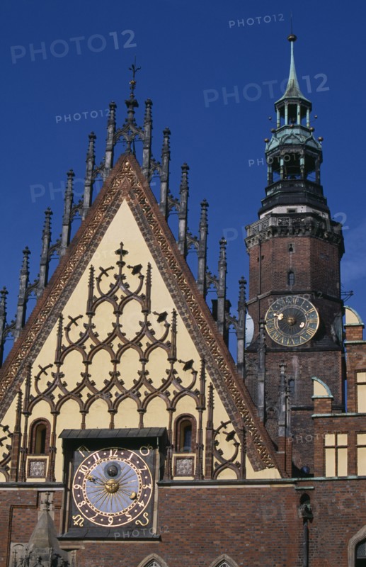 POLAND, Wroclaw, Wroclaw Town Hall dating from the fourteenth century.  Part view of exterior with decorative gable  astronomical clock and clock tower.