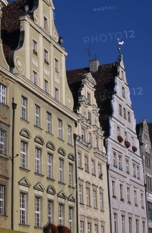 POLAND, Wroclaw, Stare Miasto.  Angled view of pastel coloured building facades in the Old Town Square.