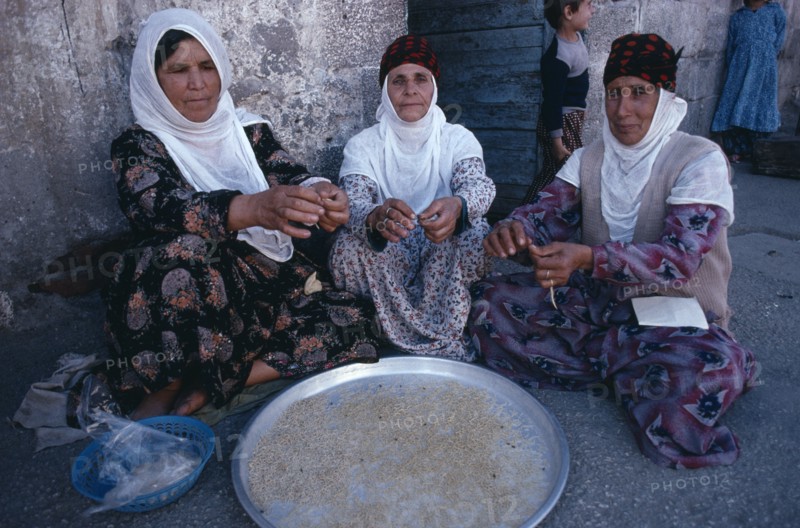 TURKEY, Diyarbakir, Kurdish women handmaking noodles.