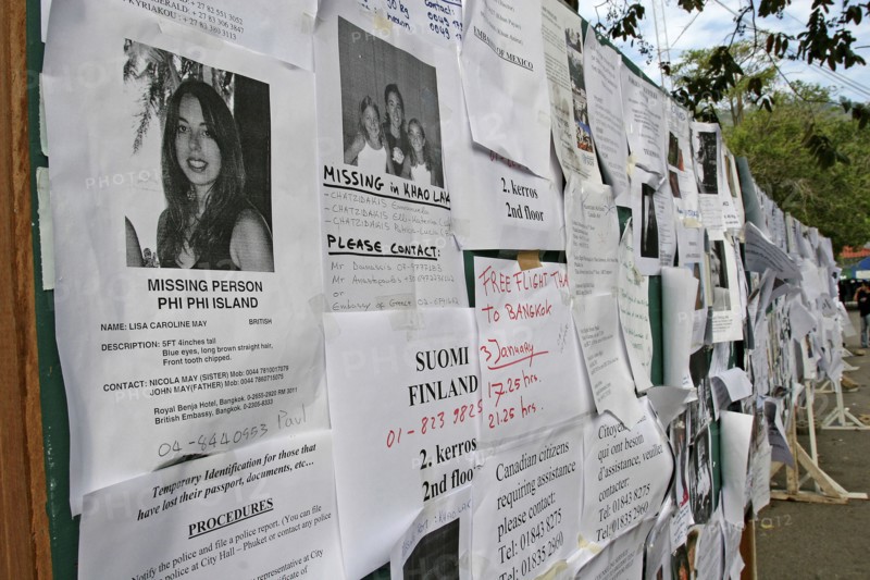 THAILAND, Phang Nga District, Phuket, Tsunami. A picture of Lisa Caroline May from britain with hundreds of other pictures of the missing at the town hall in Phuket town. On the 5th of Jan