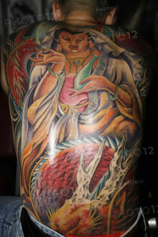 THAILAND, Phuket, Tattoos on mans back.