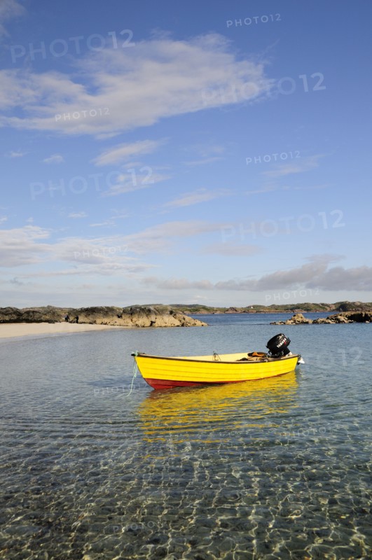 SCOTLAND, Argyll, Isle Of Mull, Yellow boat anchored in clear waters