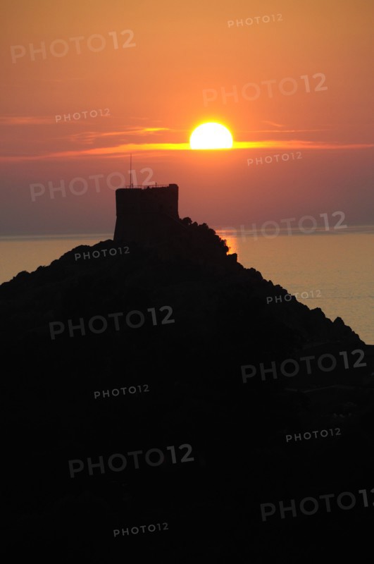 FRANCE, Corsica, Golfe De Porto, "Porto, Genoese tower against sunset"