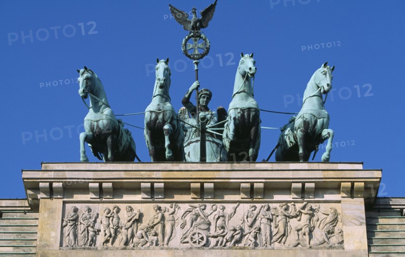 GERMANY, Berlin, "The Brandenburg Gate.  The Quadriga on top of the gate.  Chariot drawn by four horses driven by Victoria, Roman goddess of victory."