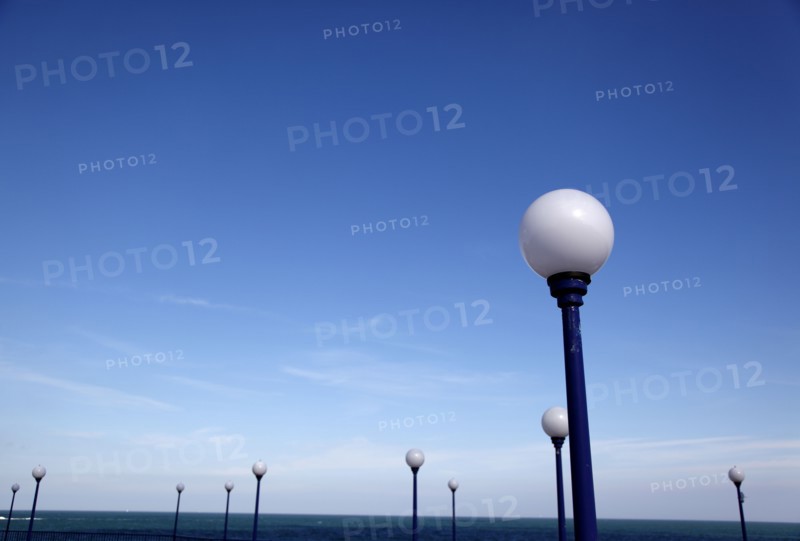 ENGLAND, East Sussex, Eastbourne, Detail of lamps on promenade next to the bandstand..