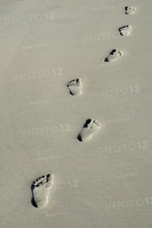 USA, Georgia, Tybee Island, Human footprints in the sand.