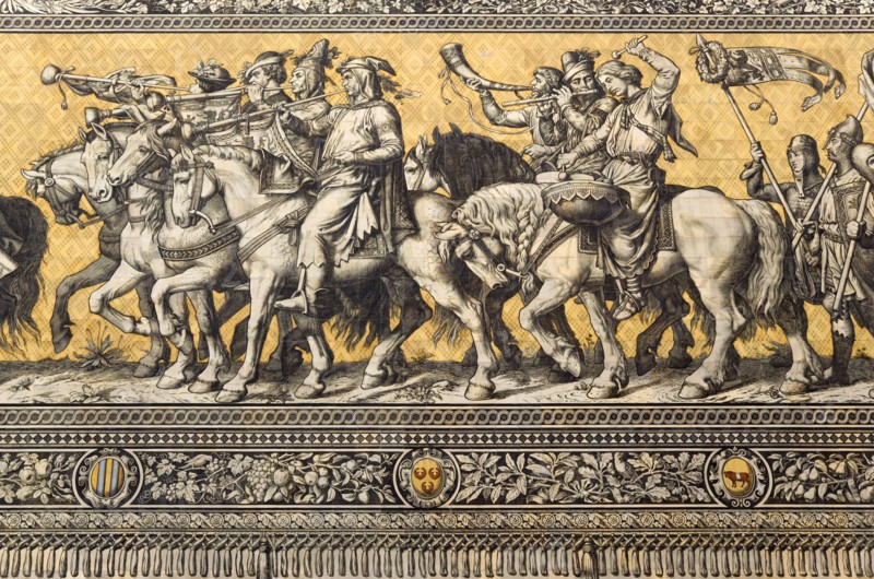 GERMANY, Saxony, Dresden, "Frstenzug or Procession of the Dukes in Auguststrasse a mural on 25,000 Meissen tiles that depicts 35 noblemen from the 12th century Konrad the Great, to Friedrich August III, Saxony's last king, who ruled from 1904-1918. It was originally painted by Wilhelm Walter between 1870 and 1876 but eventually, the stucco began to crumble and around 1906-'07 it was replaced by the tiles."