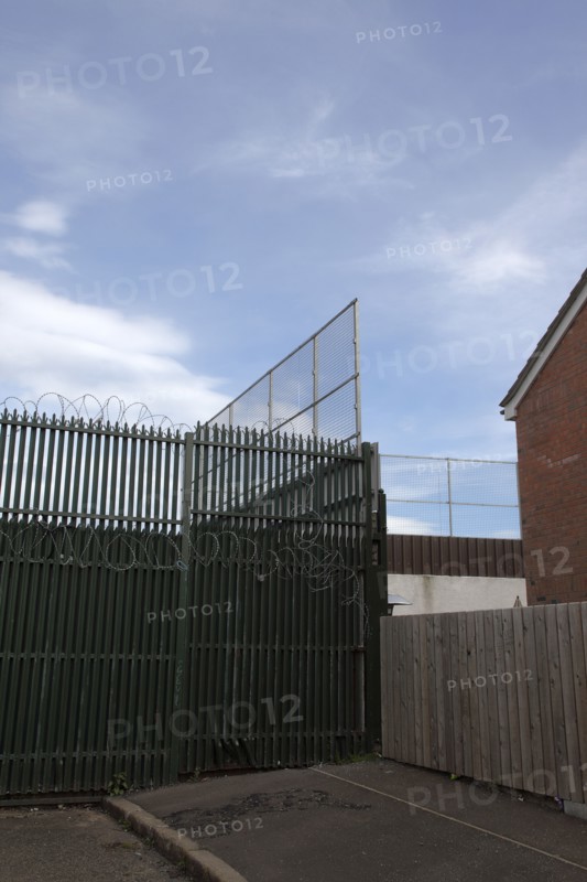 IRELAND, North, Belfast, "West, Falls Road, Peace Line barrier between the Catholic Lower Falls and Protestant Shankill areas"
