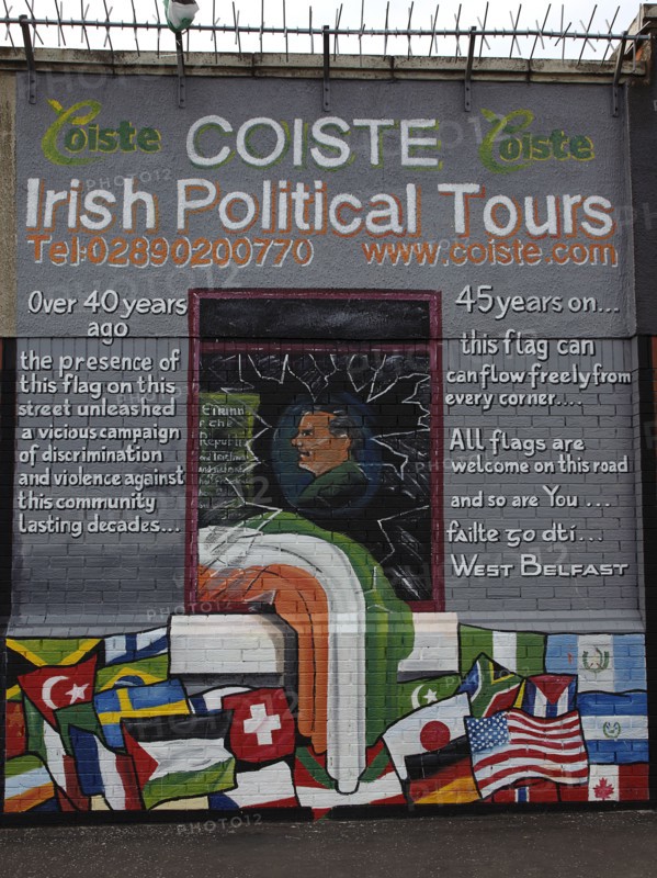 IRELAND, North, Belfast, "West, Falls Road, Political murals painted on walls of the Lower Falls Road area."
