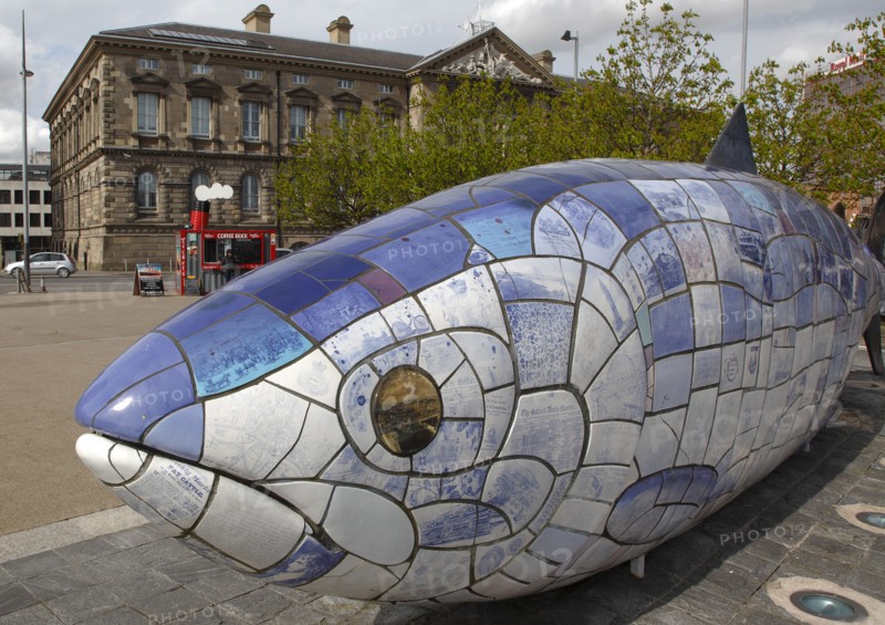 IRELAND, North, Belfast, "Donegall Quay, The Big Fish Sculpture by John Kindness. The scales of the fish are pieces of printed blue tiles with details of Belfasts history. The 10 metre long structure is situated beside the Lagan Weir opposite the old Custom House"