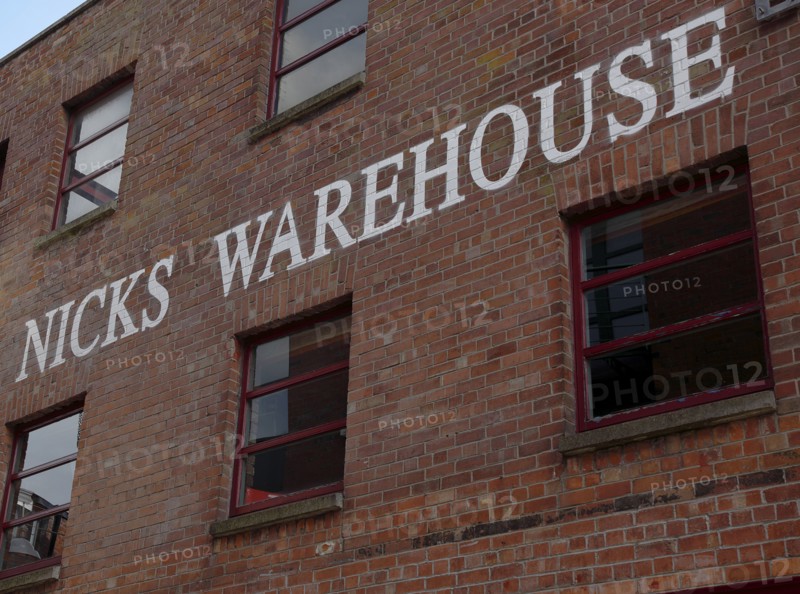 IRELAND, North, Belfast, "Cathedral Quarter, Hill Street, Nicks Warehouse a former bonded warehouse for Bushmills whiskey now a restaurant and wine bar."