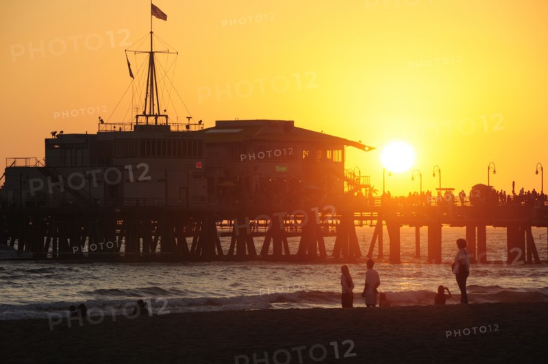 USA, California, Los Angeles, Santa Monica pier Silhouetted at sunset