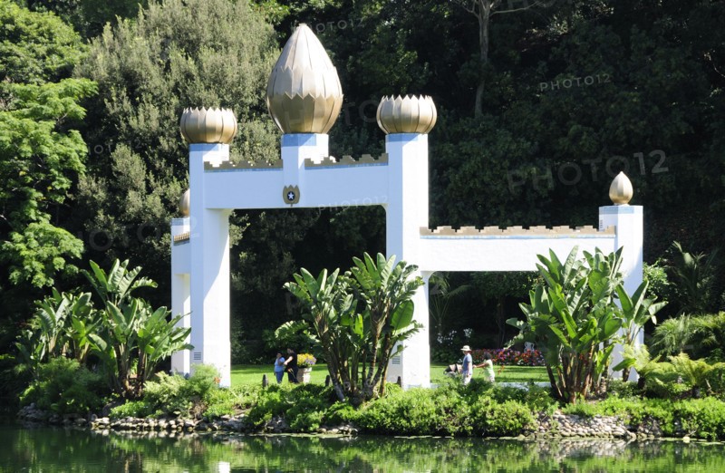 USA, California, Los Angeles, "View across lake to Golden Lotus Archway, Self Realization Lake Shrine, Pacific Palisades"