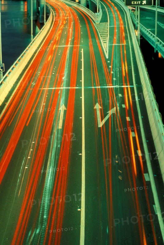 TRANSPORT, Road, Cars, Red and yellow blurred light trails from night time traffic.