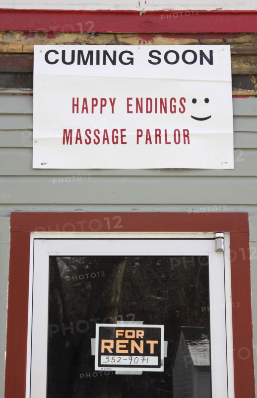 USA, New Hampshire, Keene, "Sign on building, cuming soon, Happy Endings Massage Parlor."