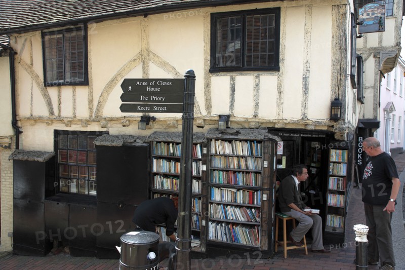 ENGLAND, East Sussex, Lewes, "High Street, Keere Street cobbled pathway with traditional buildings and 15th century bookshop."